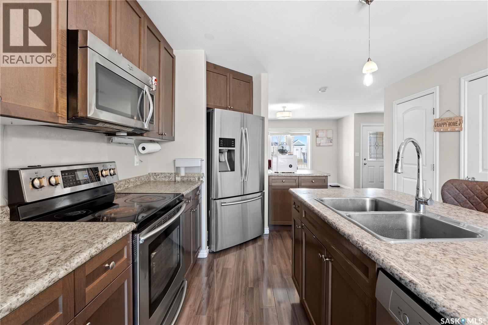 1334 Hunter Road, Saskatoon, SK - Indoor Photo Showing Kitchen With Stainless Steel Kitchen With Double Sink With Upgraded Kitchen