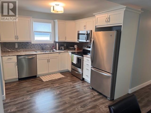 8 Riverloop Crescent, Gander Bay, NL - Indoor Photo Showing Kitchen With Double Sink