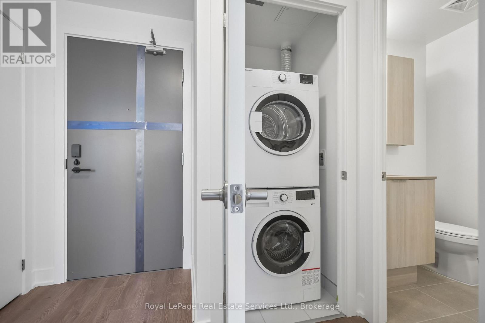 711 - 2088 James Street, Burlington (Brant), ON - Indoor Photo Showing Laundry Room