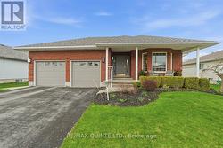 Front of house, nice garden, covered porch -