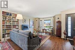 living room - new flooring and cozy gas fireplace -
