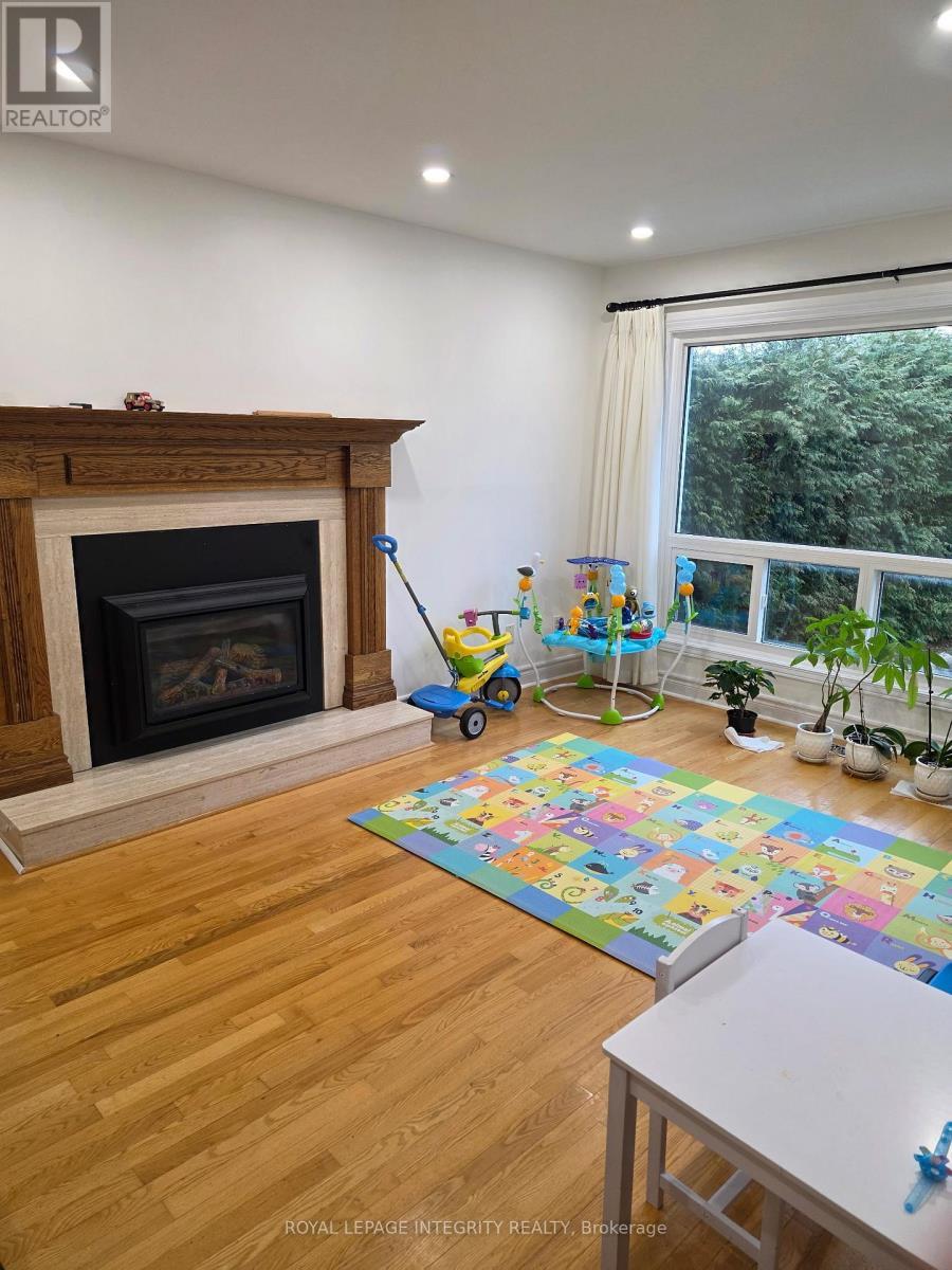 63 Topley Crescent, Ottawa, ON - Indoor Photo Showing Living Room With Fireplace