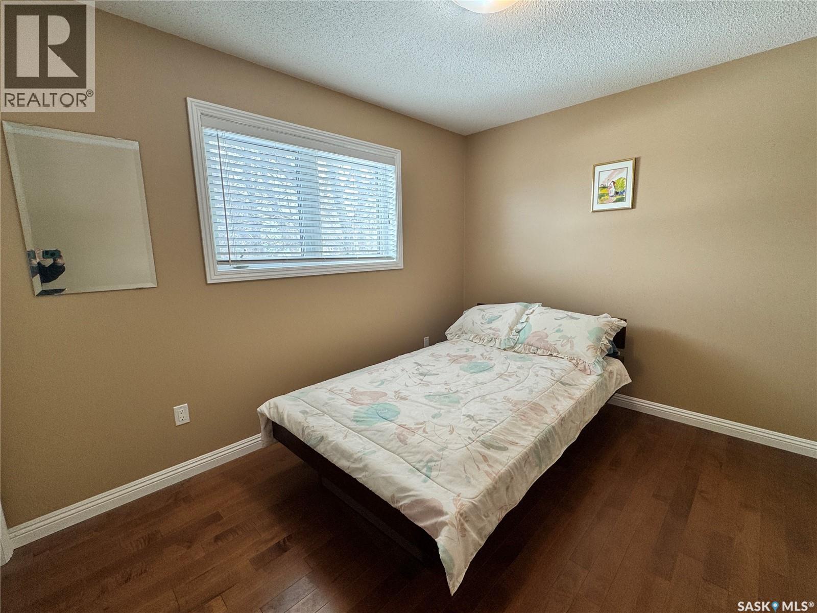 218 5Th Avenue E, Biggar, SK - Indoor Photo Showing Bedroom