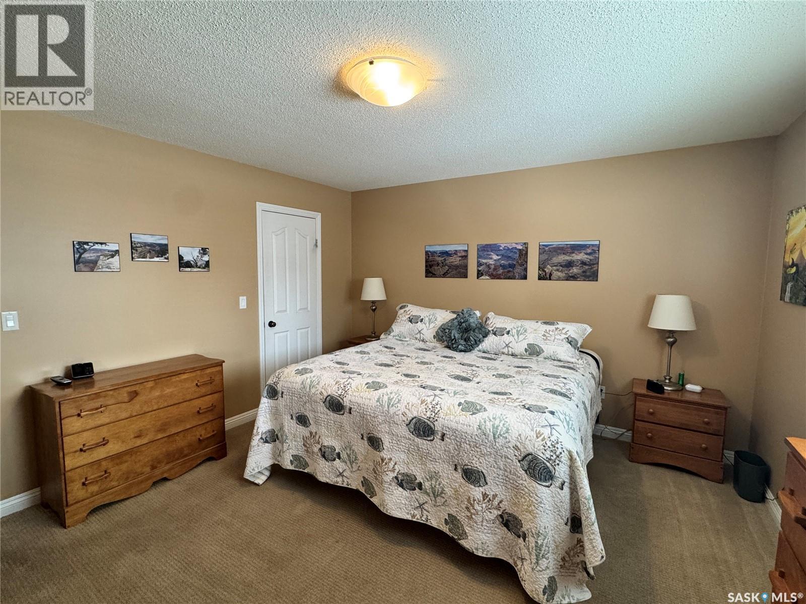 218 5Th Avenue E, Biggar, SK - Indoor Photo Showing Bedroom