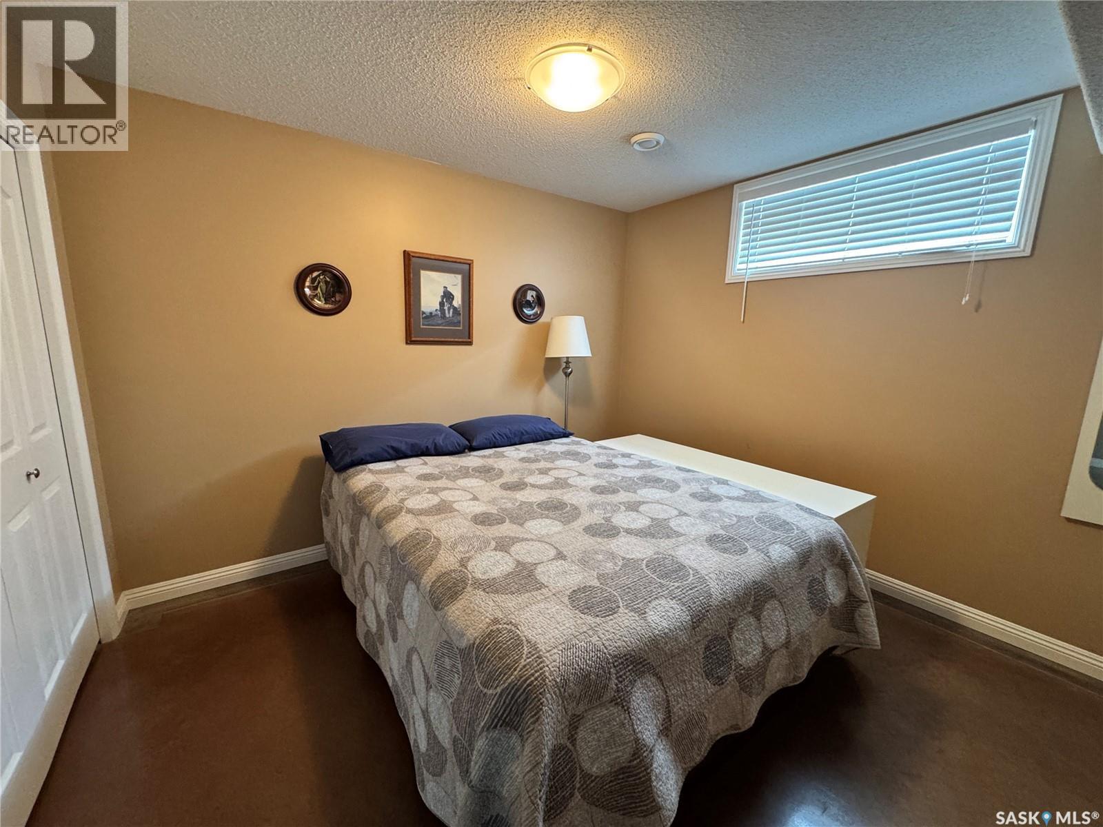 218 5Th Avenue E, Biggar, SK - Indoor Photo Showing Bedroom