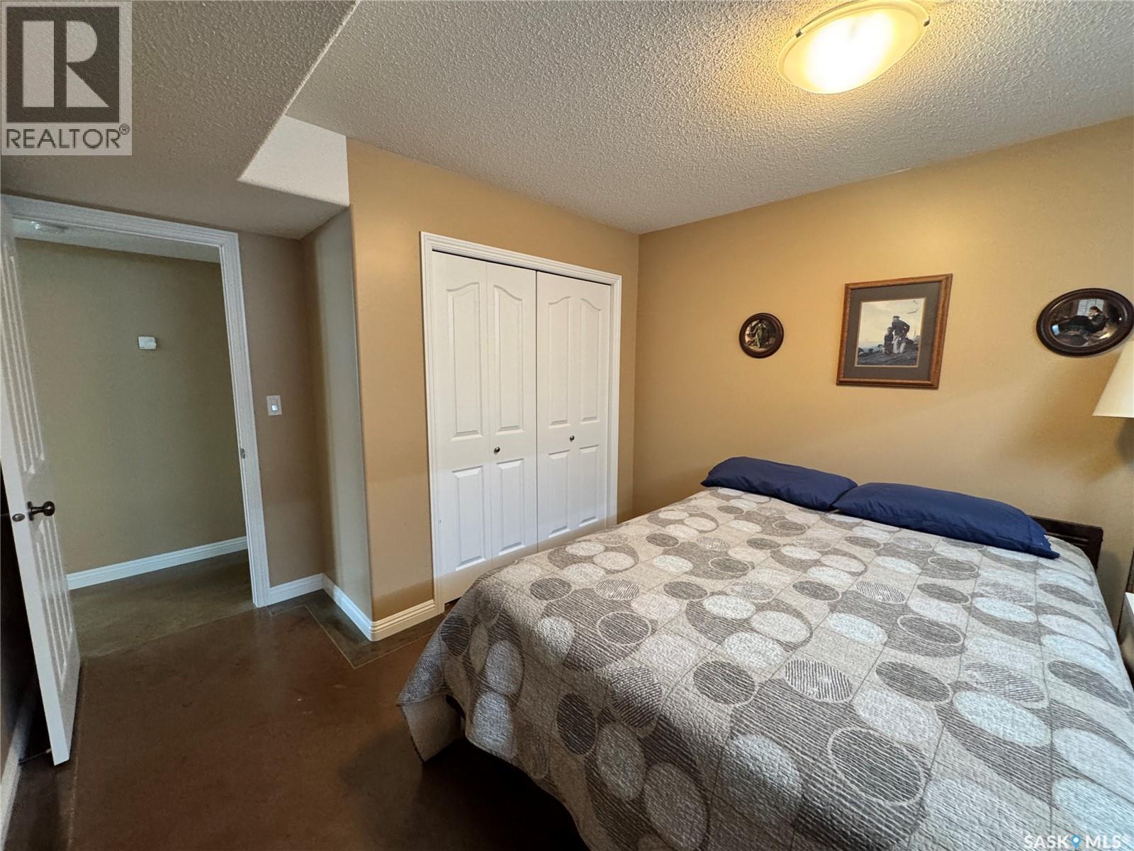 218 5Th Avenue E, Biggar, SK - Indoor Photo Showing Bedroom