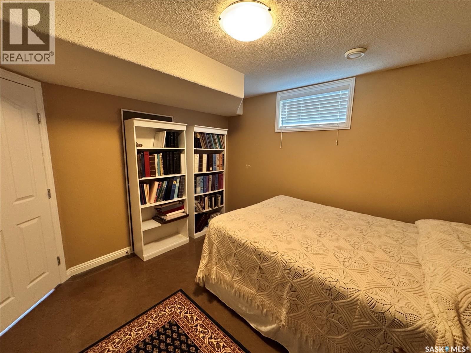 218 5Th Avenue E, Biggar, SK - Indoor Photo Showing Bedroom