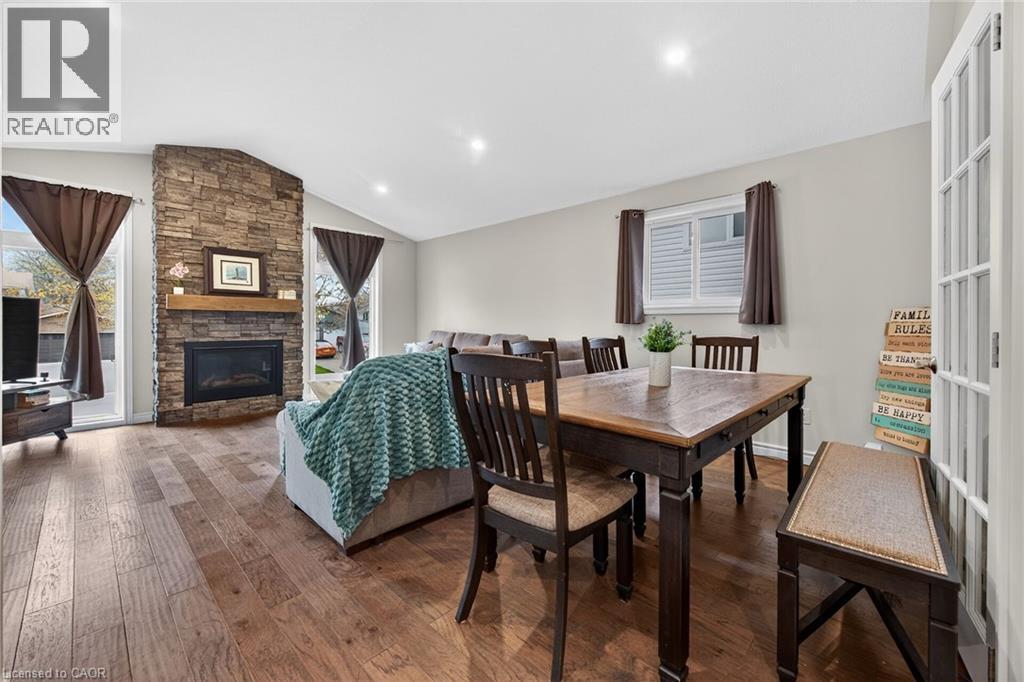 6 Kintyre Court, Caledonia, ON - Indoor Photo Showing Dining Room With Fireplace