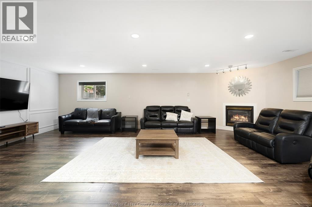 4205 Barton Crescent, Windsor, ON - Indoor Photo Showing Living Room With Fireplace