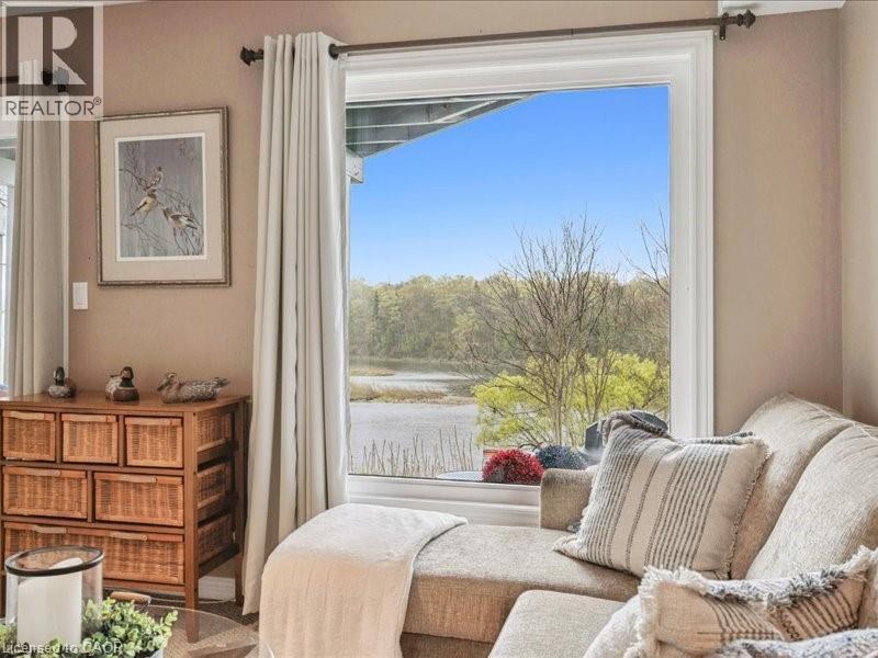 Relax in your recreation room overlooking The Grand River. - 245 Bishop Street S Unit# 4, Cambridge, ON - Indoor