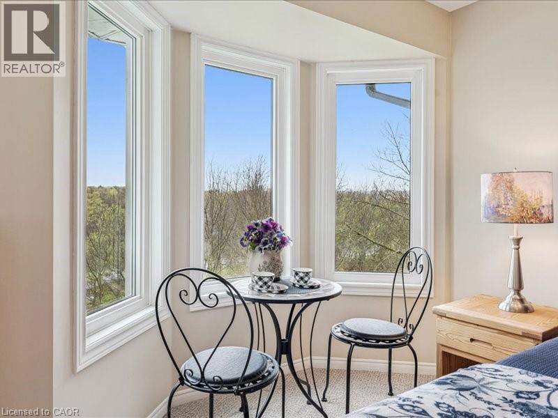 Bay window in Primary bedroom, perfect view of the sunrise while enjoying your morning coffee/tea. - 245 Bishop Street S Unit# 4, Cambridge, ON - Indoor