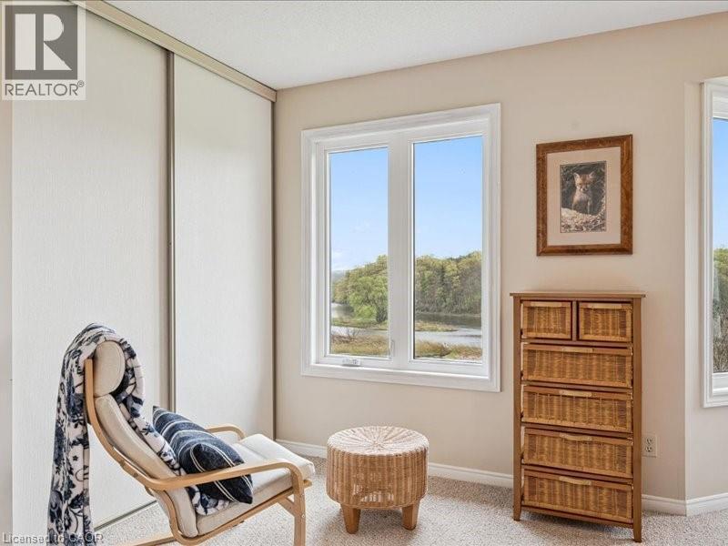 Picture window showcasing a natural landscape - 245 Bishop Street S Unit# 4, Cambridge, ON - Indoor
