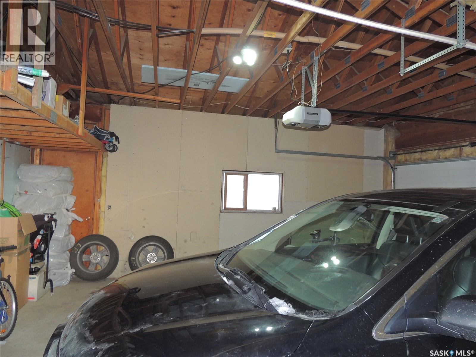 421 Maple Bay, Estevan, SK - Indoor Photo Showing Garage