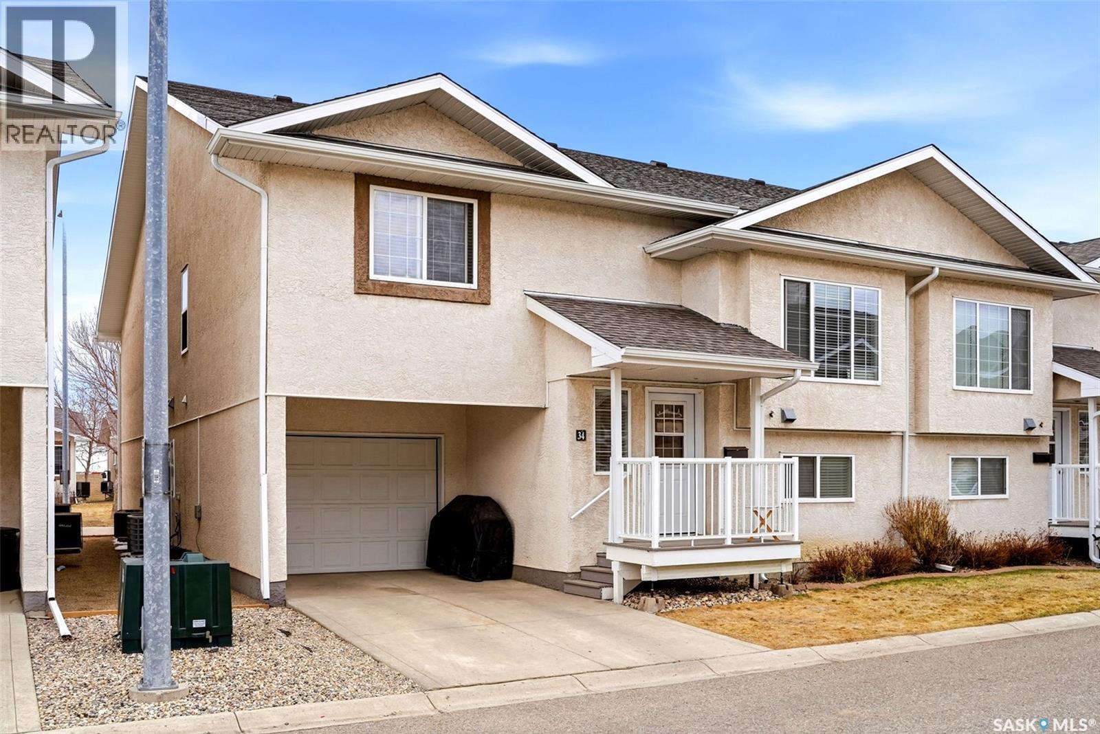 34 4425 Nicurity Drive, Regina, SK - Outdoor With Facade