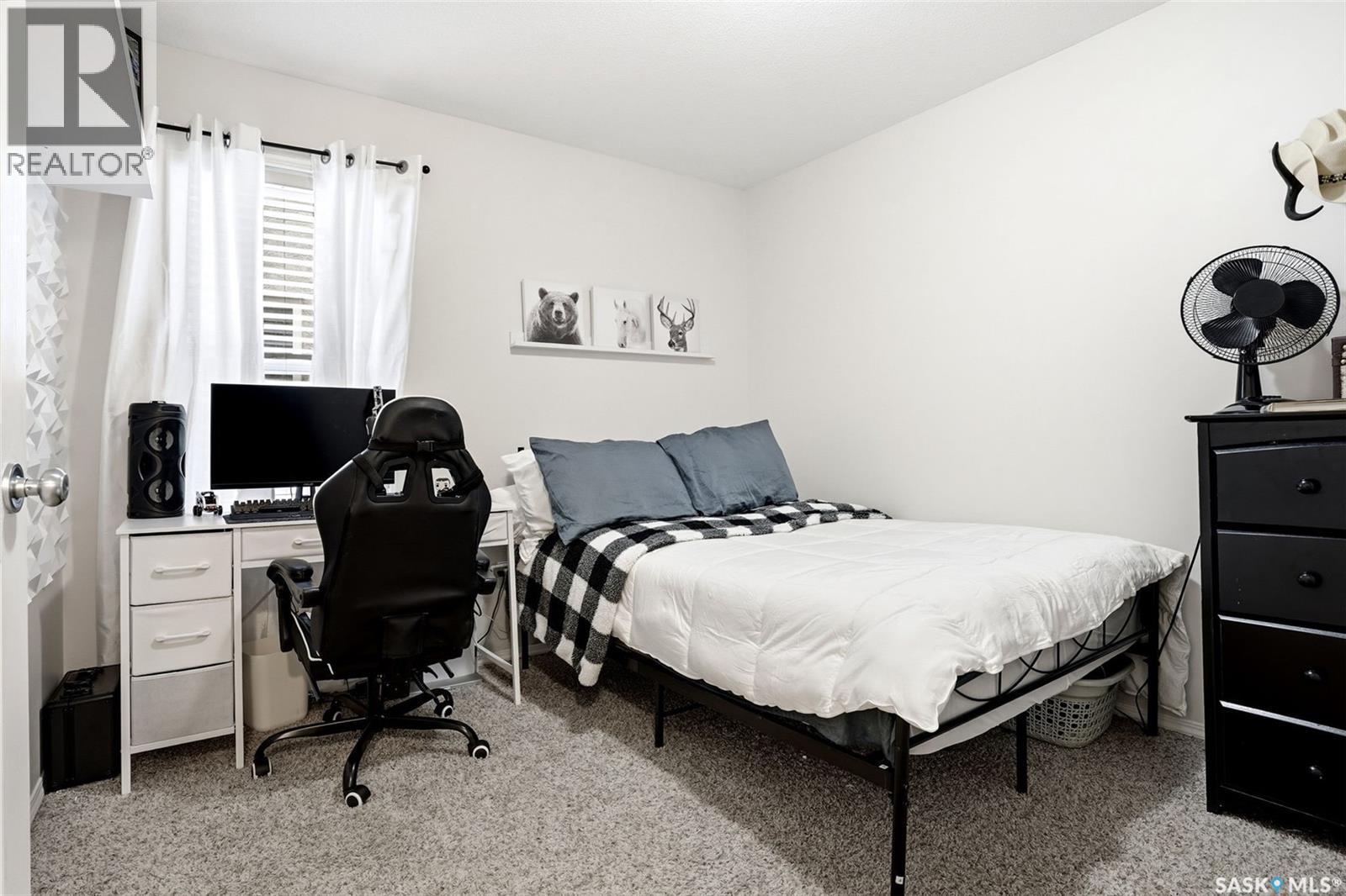 34 4425 Nicurity Drive, Regina, SK - Indoor Photo Showing Bedroom