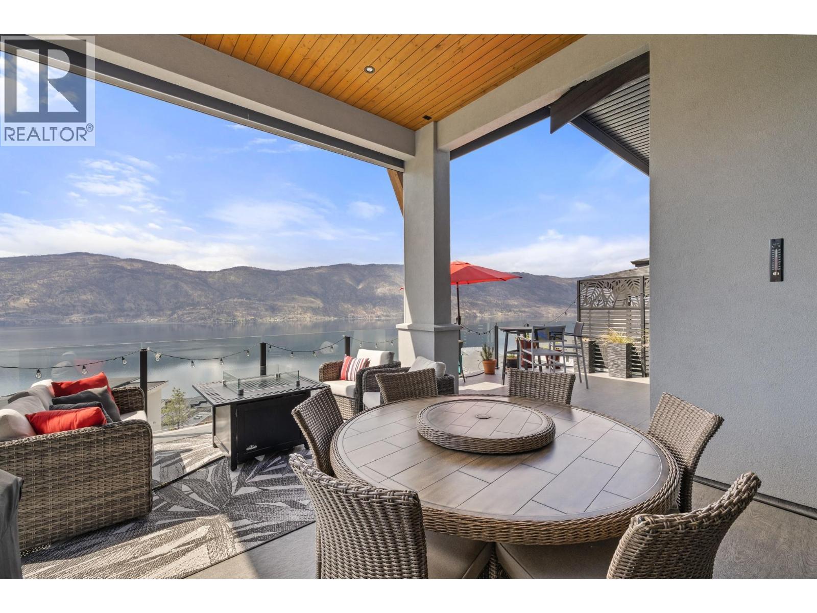 Upper deck - 3663 Mckinley Beach Drive, Kelowna, BC - Outdoor With Body Of Water With Deck Patio Veranda With Exterior