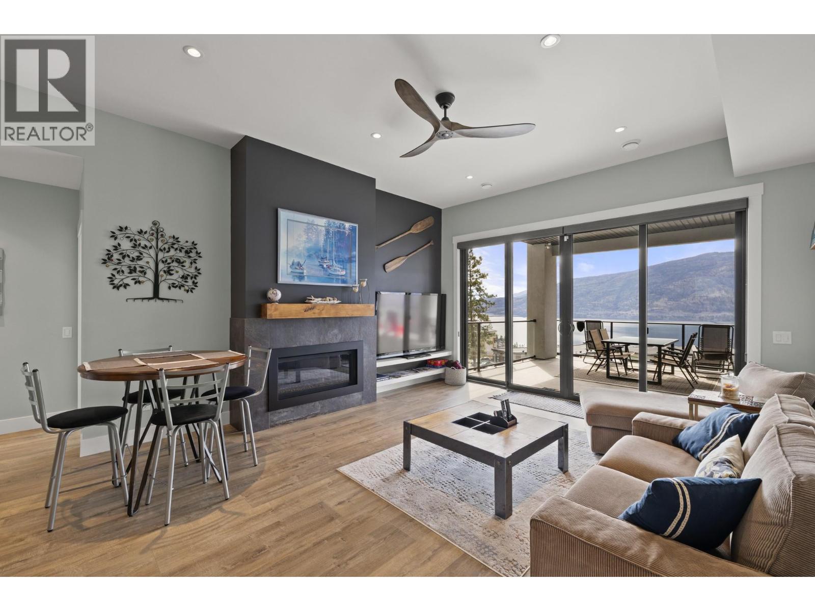 Suite - 3663 Mckinley Beach Drive, Kelowna, BC - Indoor Photo Showing Living Room With Fireplace