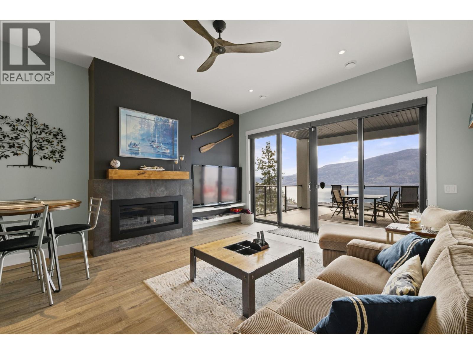 Suite - 3663 Mckinley Beach Drive, Kelowna, BC - Indoor Photo Showing Living Room With Fireplace