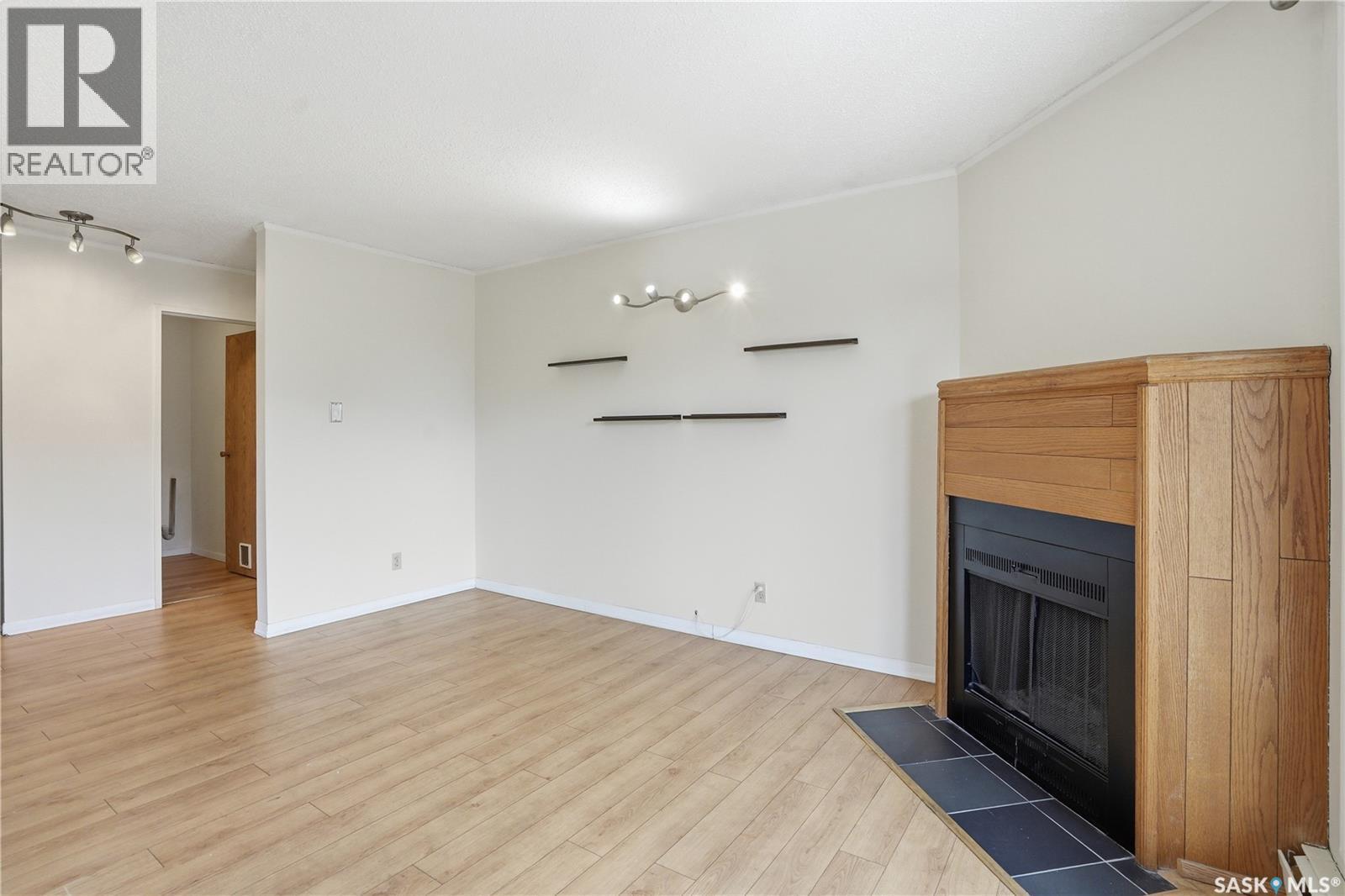 316B 4040 8Th Street E, Saskatoon, SK - Indoor With Fireplace