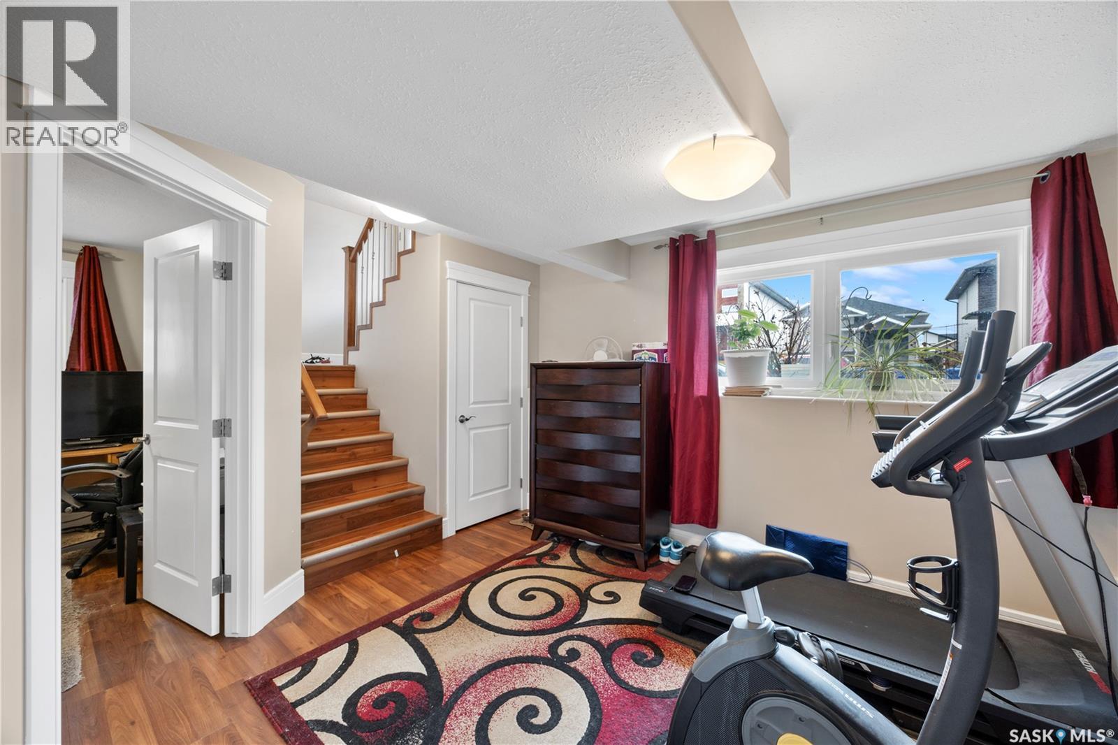 350 Marlatte Street, Saskatoon, SK - Indoor Photo Showing Gym Room