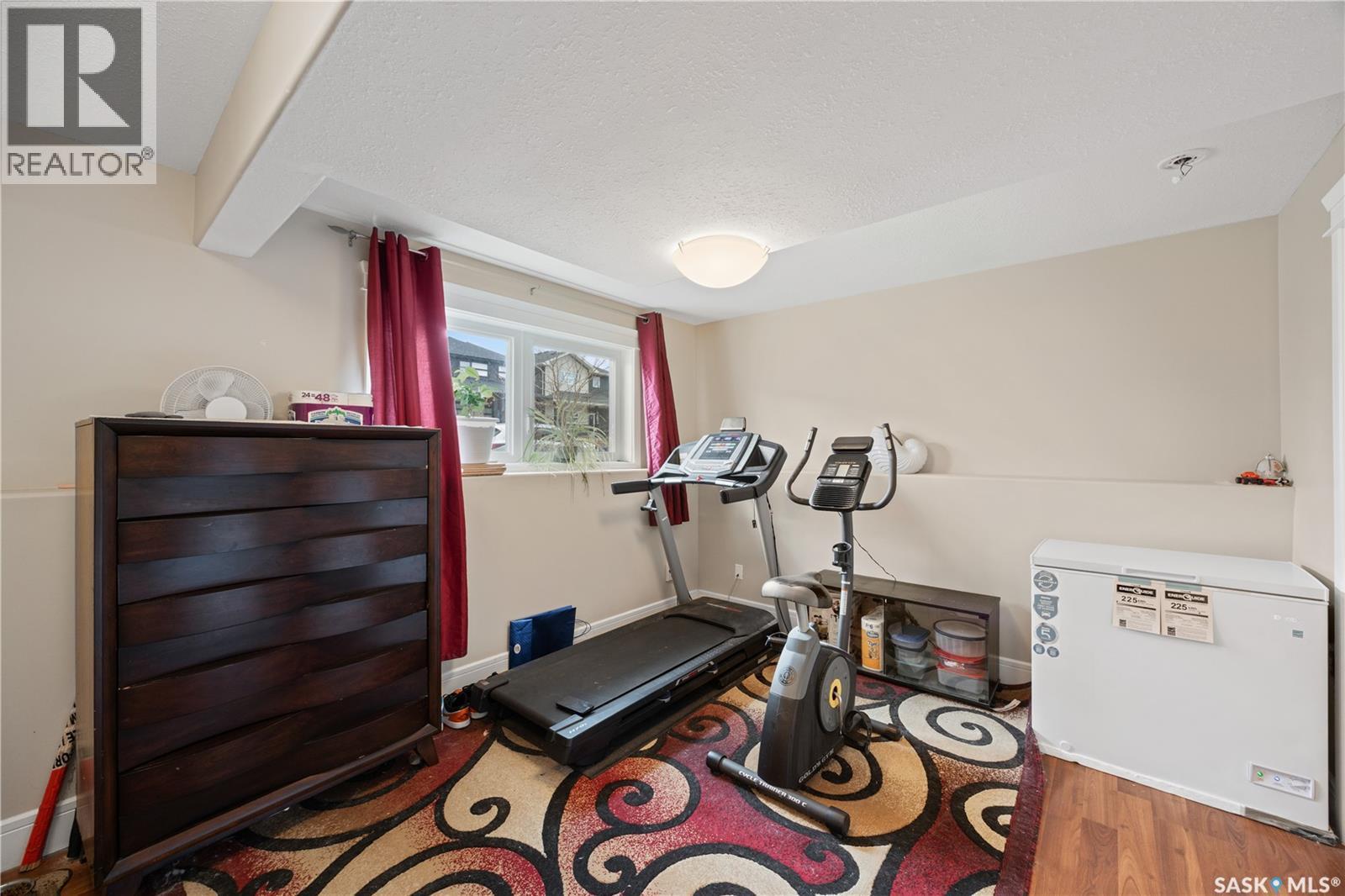 350 Marlatte Street, Saskatoon, SK - Indoor Photo Showing Gym Room