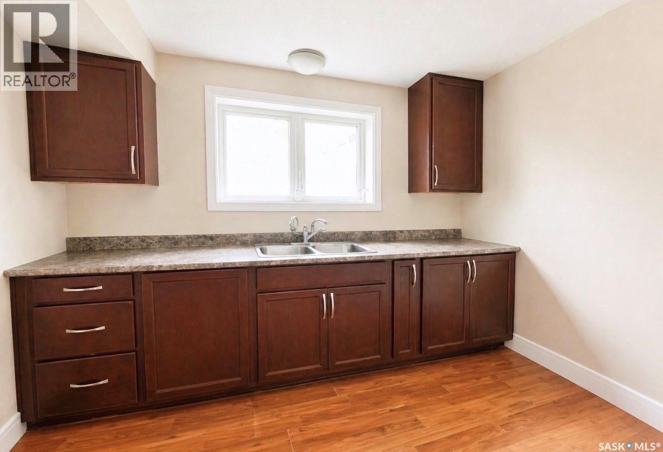 350 Marlatte Street, Saskatoon, SK - Indoor Photo Showing Kitchen With Double Sink