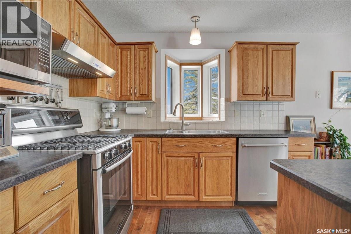 116 420 Heritage Crescent, Saskatoon, SK - Indoor Photo Showing Kitchen With Double Sink