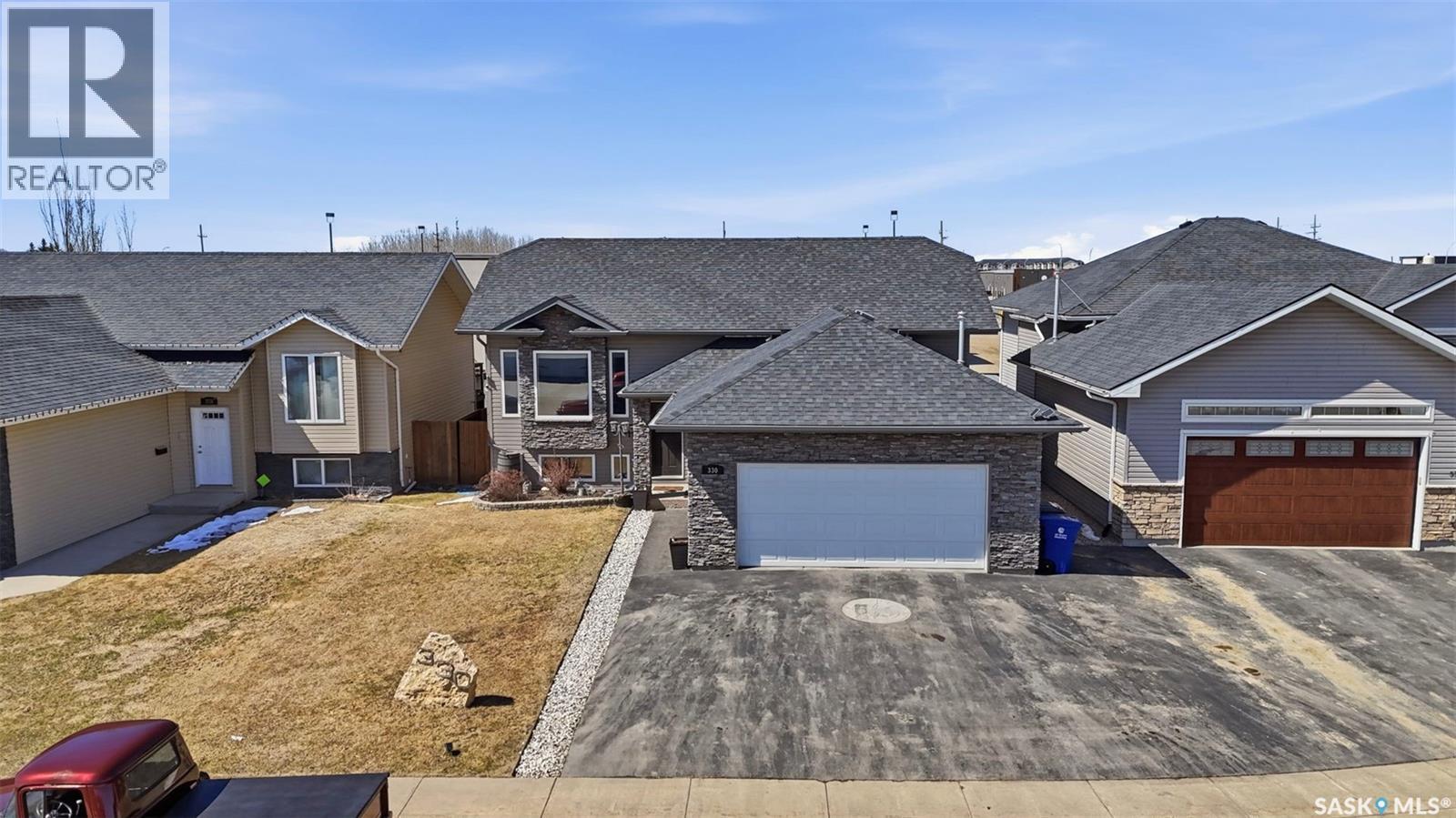 330 Player Crescent, Warman, SK - Outdoor With Facade