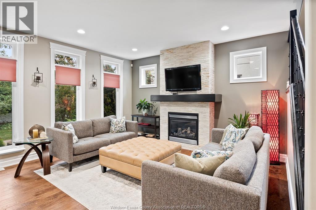 1265 Maple, Lasalle, ON - Indoor Photo Showing Living Room With Fireplace