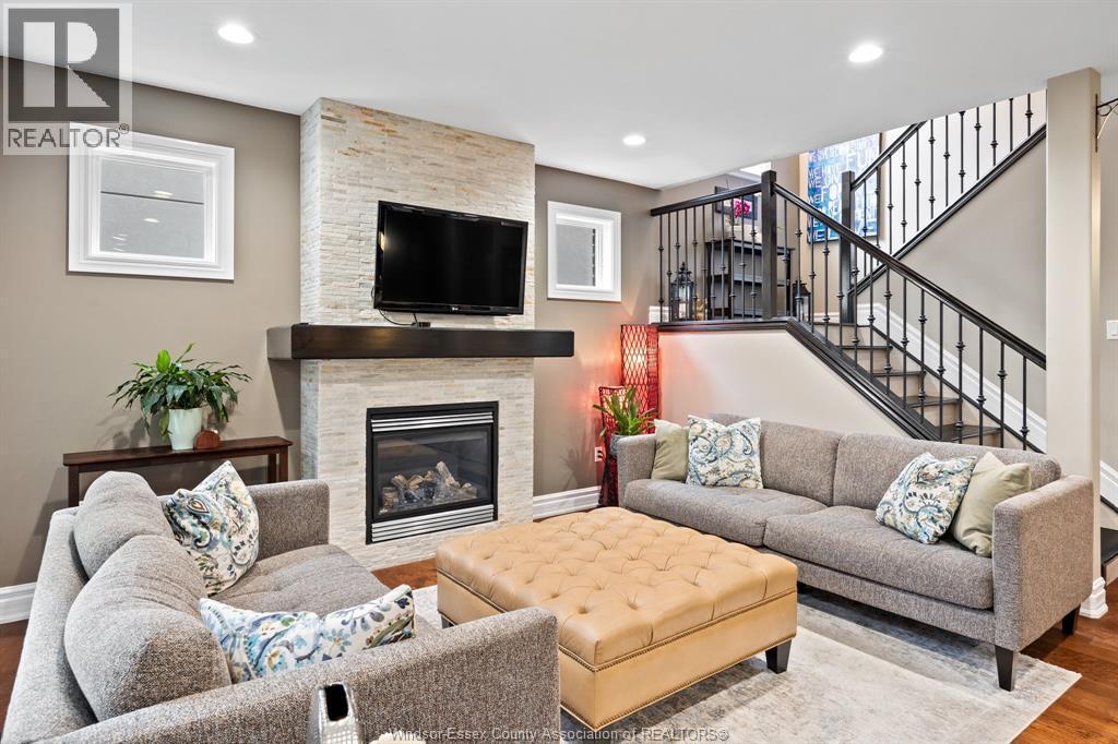 1265 Maple, Lasalle, ON - Indoor Photo Showing Living Room With Fireplace