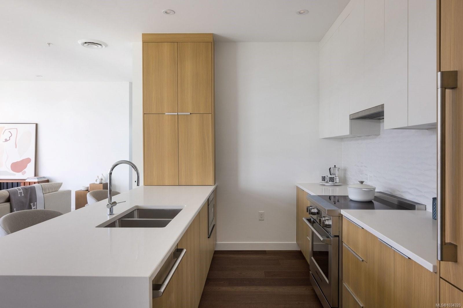 #108-9570 Fifth St, Sidney, BC - Indoor Photo Showing Kitchen With Double Sink