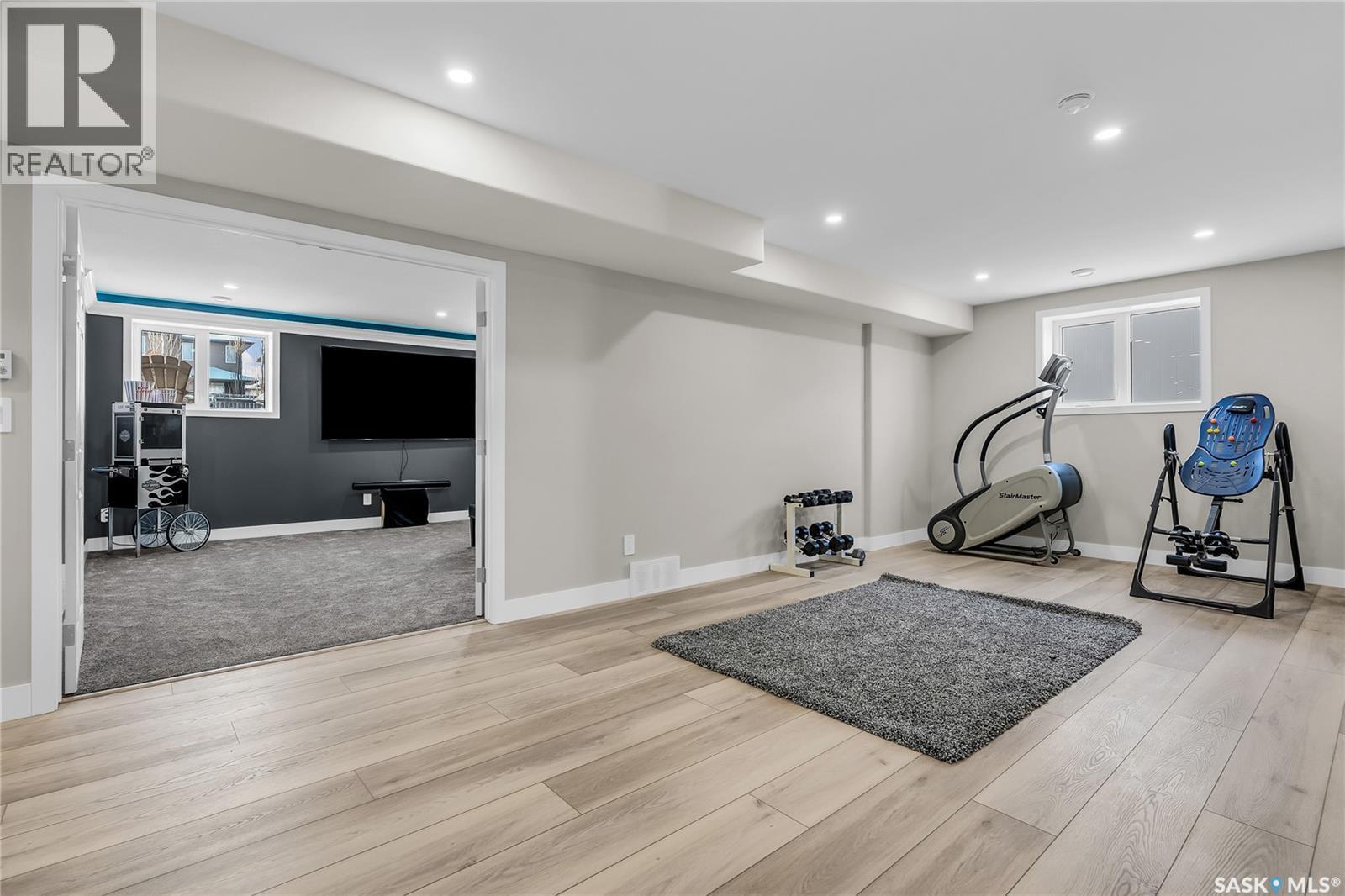 7 Loewen Court, Warman, SK - Indoor Photo Showing Gym Room