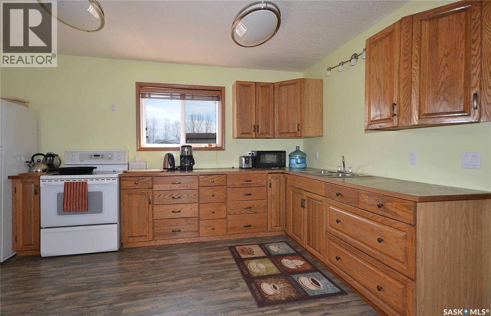 6 Bronco Drive, Delaronde Lake, SK - Indoor Photo Showing Kitchen With Double Sink