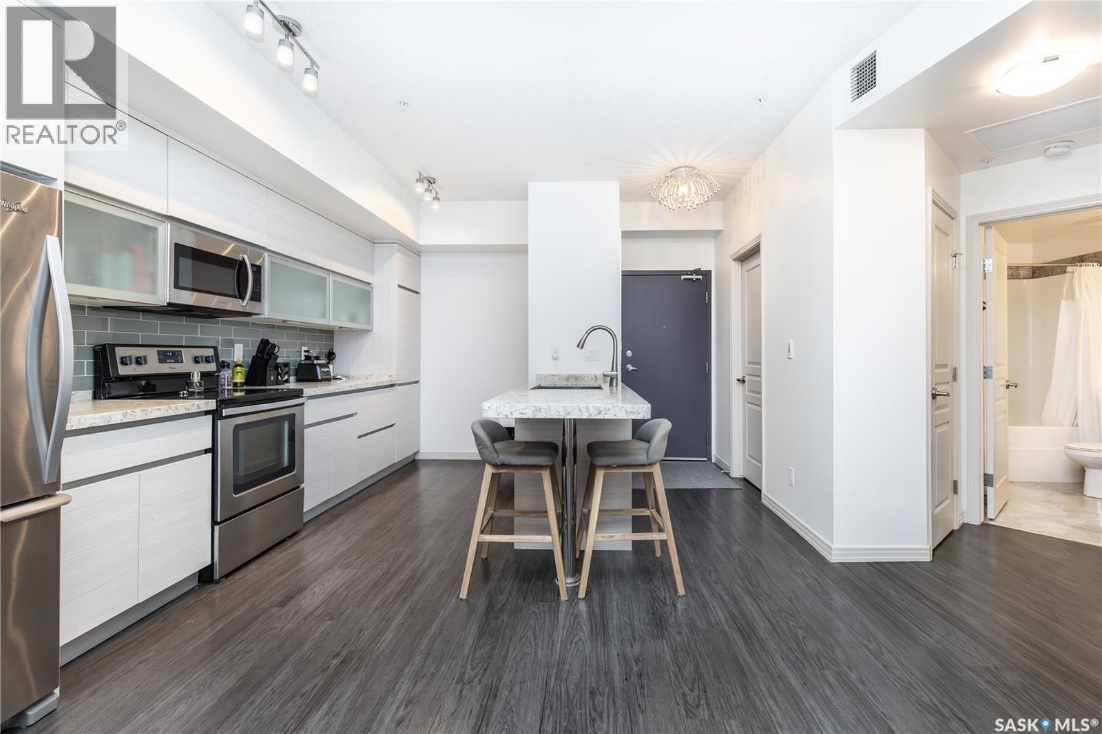 122 223 Evergreen Square, Saskatoon, SK - Indoor Photo Showing Kitchen With Stainless Steel Kitchen