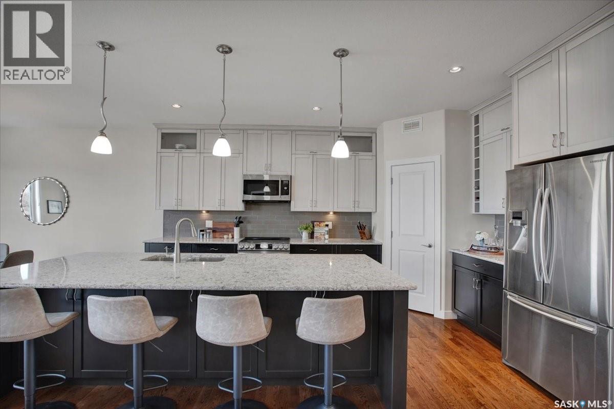 22 315 Ledingham Drive, Saskatoon, SK - Indoor Photo Showing Kitchen With Stainless Steel Kitchen With Upgraded Kitchen