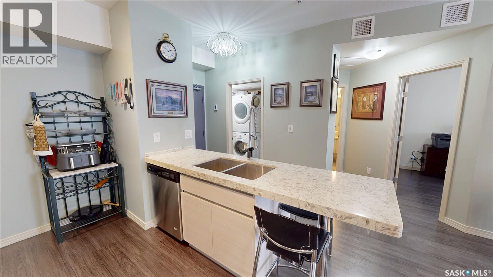 205 223 Evergreen Square, Saskatoon, SK - Indoor Photo Showing Kitchen With Double Sink
