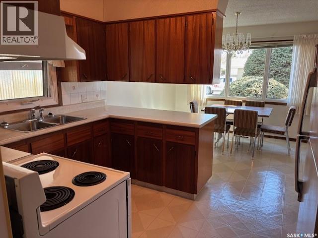 210 Alexander Avenue, Canora, SK - Indoor Photo Showing Kitchen With Double Sink