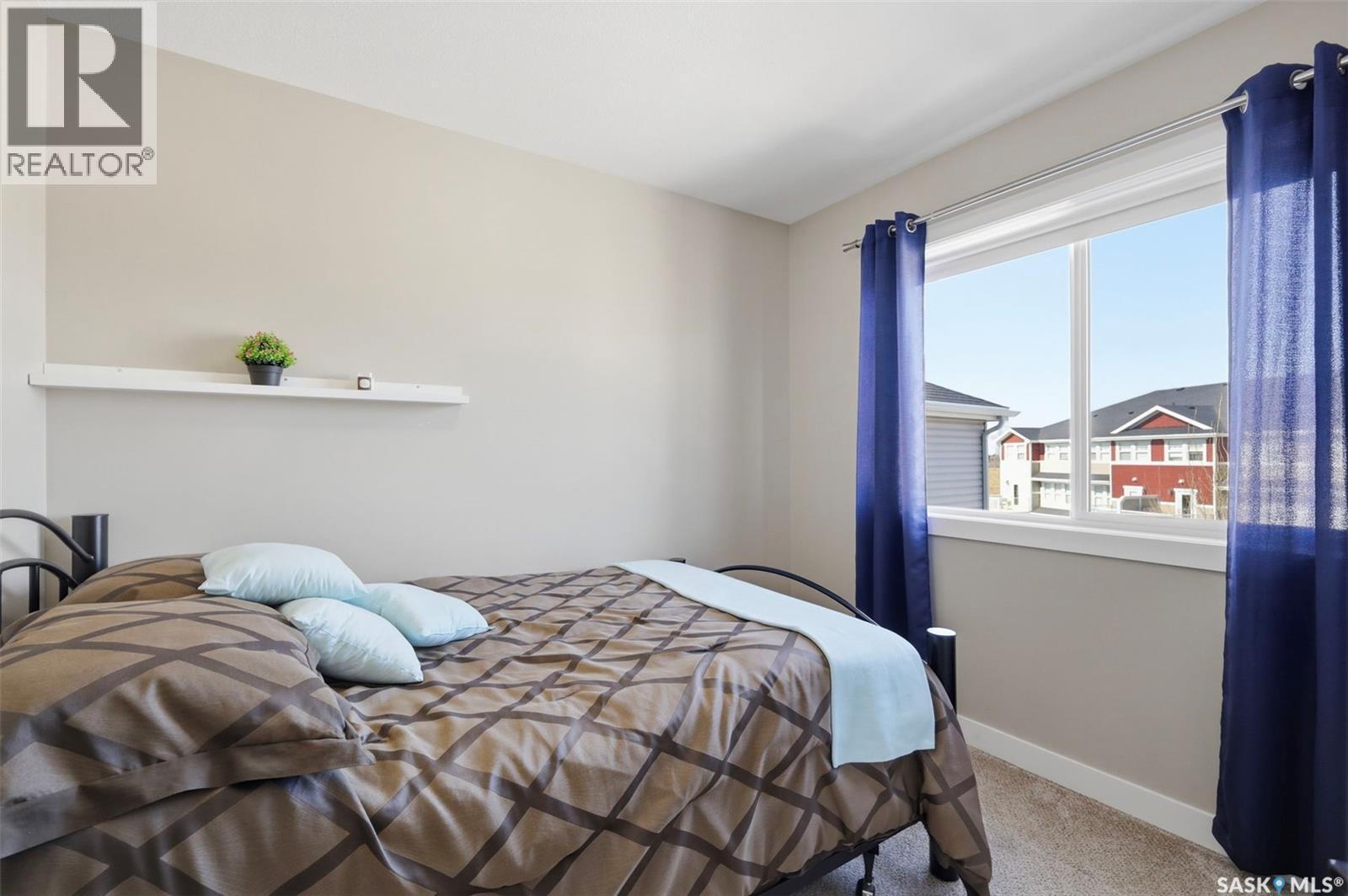 1047 Kolynchuk Crescent, Saskatoon, SK - Indoor Photo Showing Bedroom