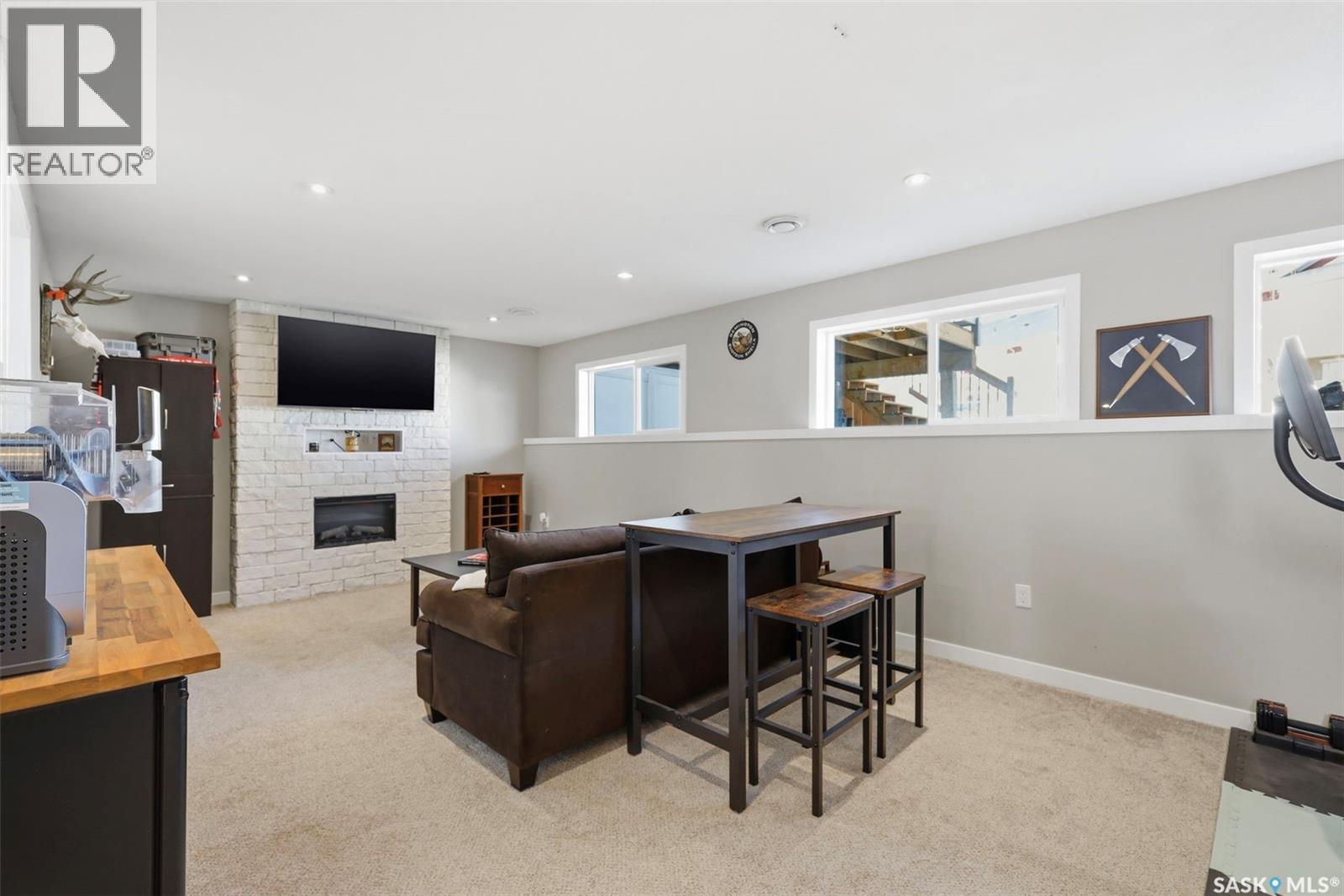 1047 Kolynchuk Crescent, Saskatoon, SK - Indoor With Fireplace