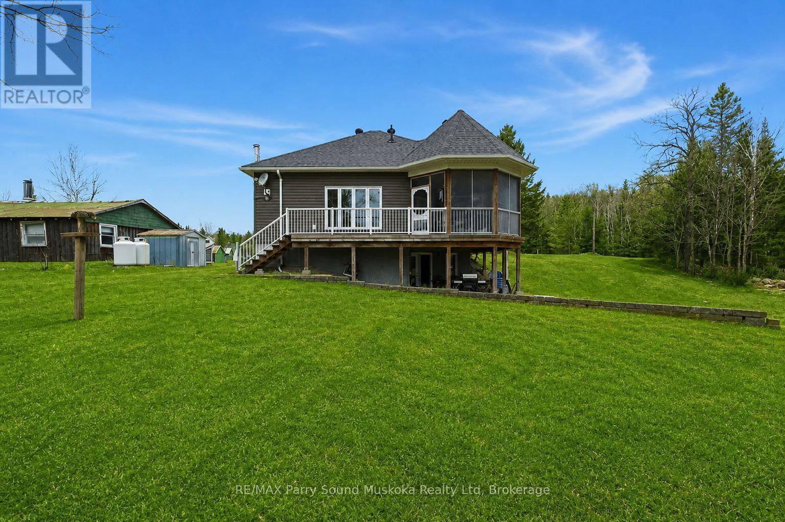 Primary home - 132 Lawson Drive, Kearney, ON - Outdoor With Deck Patio Veranda