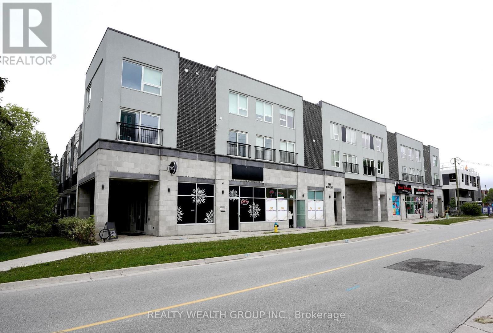 113 - 288 Albert Street, Waterloo, ON - Outdoor With Facade
