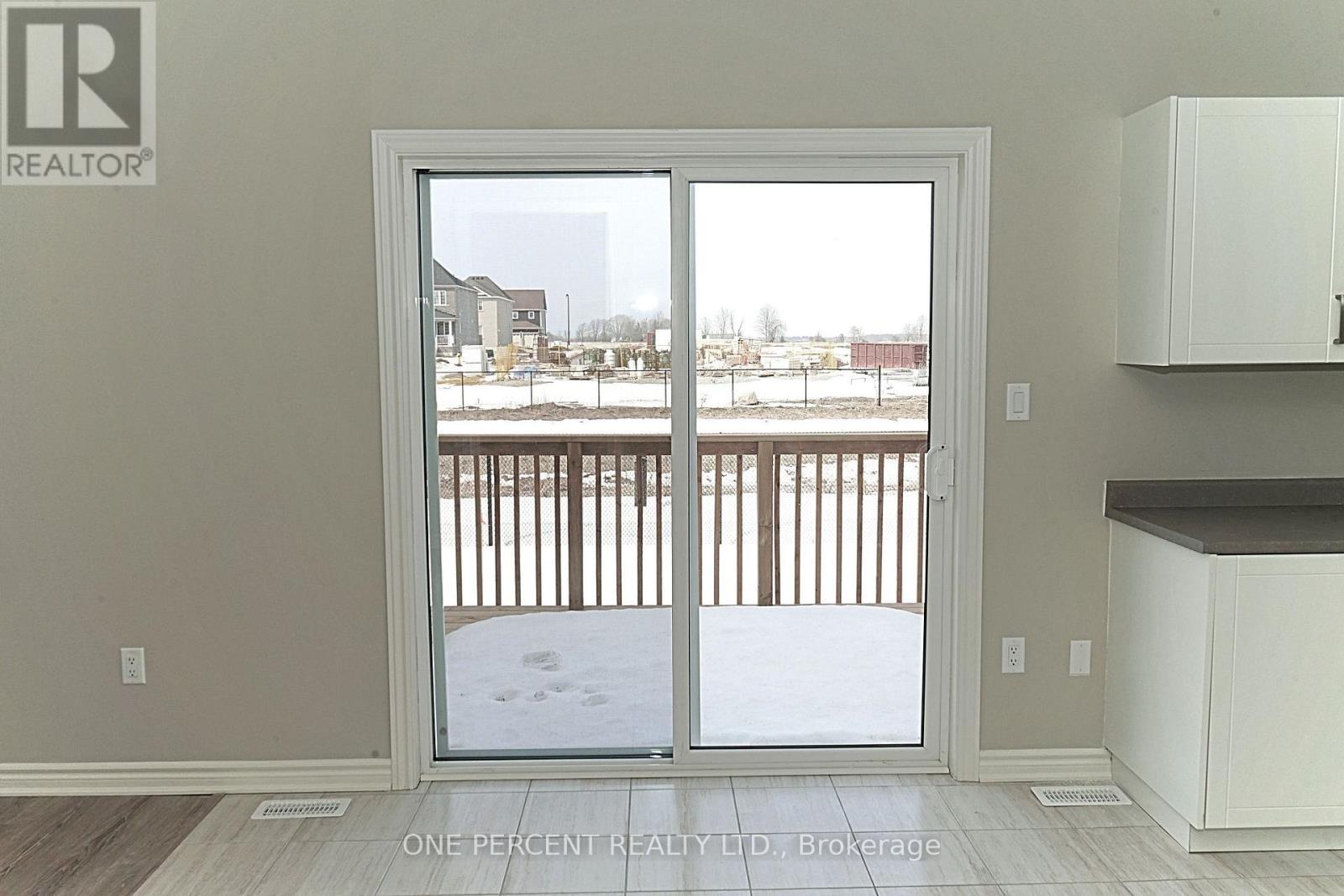 Backyard view through Door - 262 Springfield Crescent, Clearview (Stayner), ON - Indoor Photo Showing Other Room