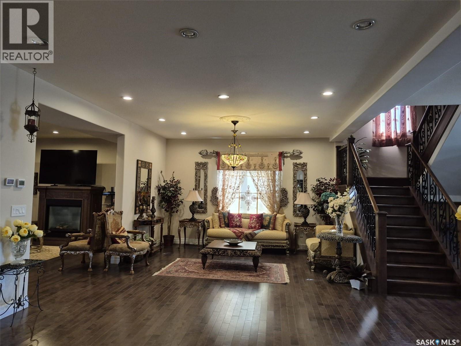319 Roy Crescent, Saskatoon, SK - Indoor Photo Showing Living Room With Fireplace