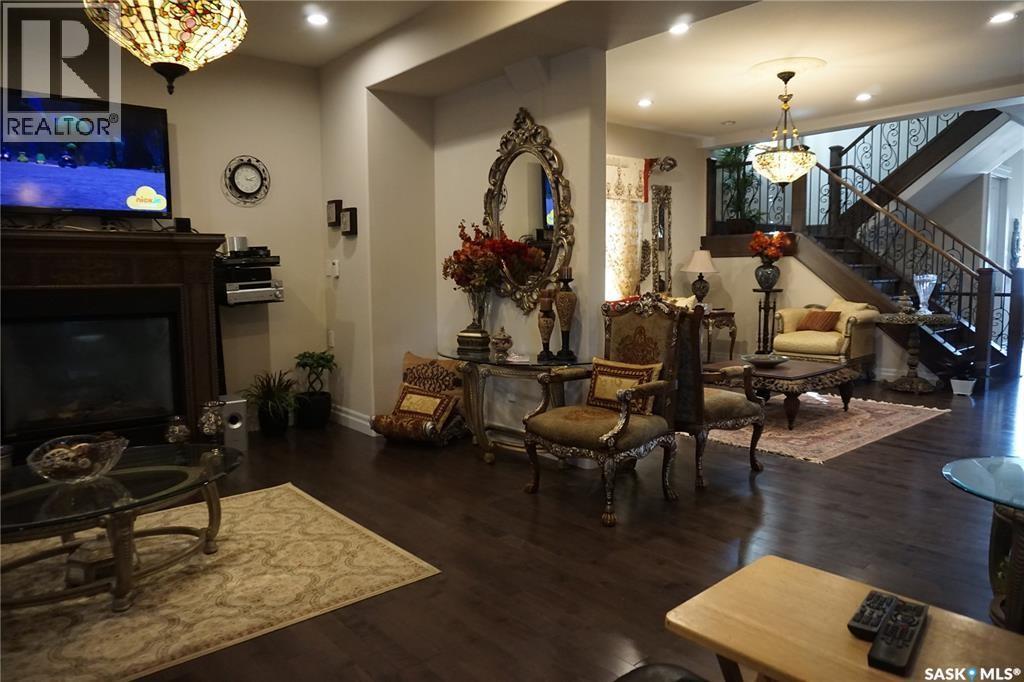 319 Roy Crescent, Saskatoon, SK - Indoor Photo Showing Other Room With Fireplace