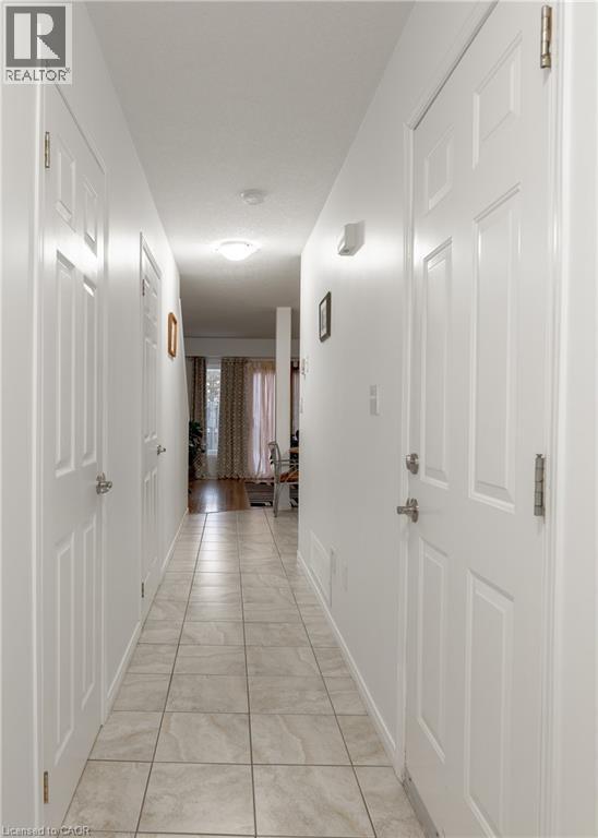 Hall with baseboards - 85 Bankside Drive Unit# E34, Kitchener, ON - Indoor Photo Showing Other Room