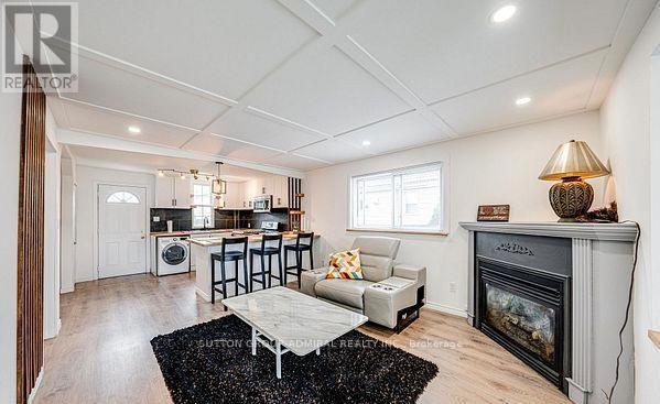 43 Adair Avenue, Hamilton, ON - Indoor Photo Showing Living Room With Fireplace