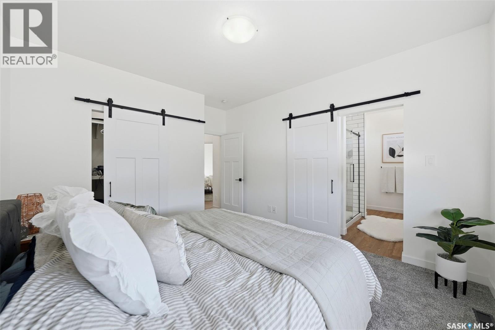 709 Sarazen Drive, Warman, SK - Indoor Photo Showing Bedroom