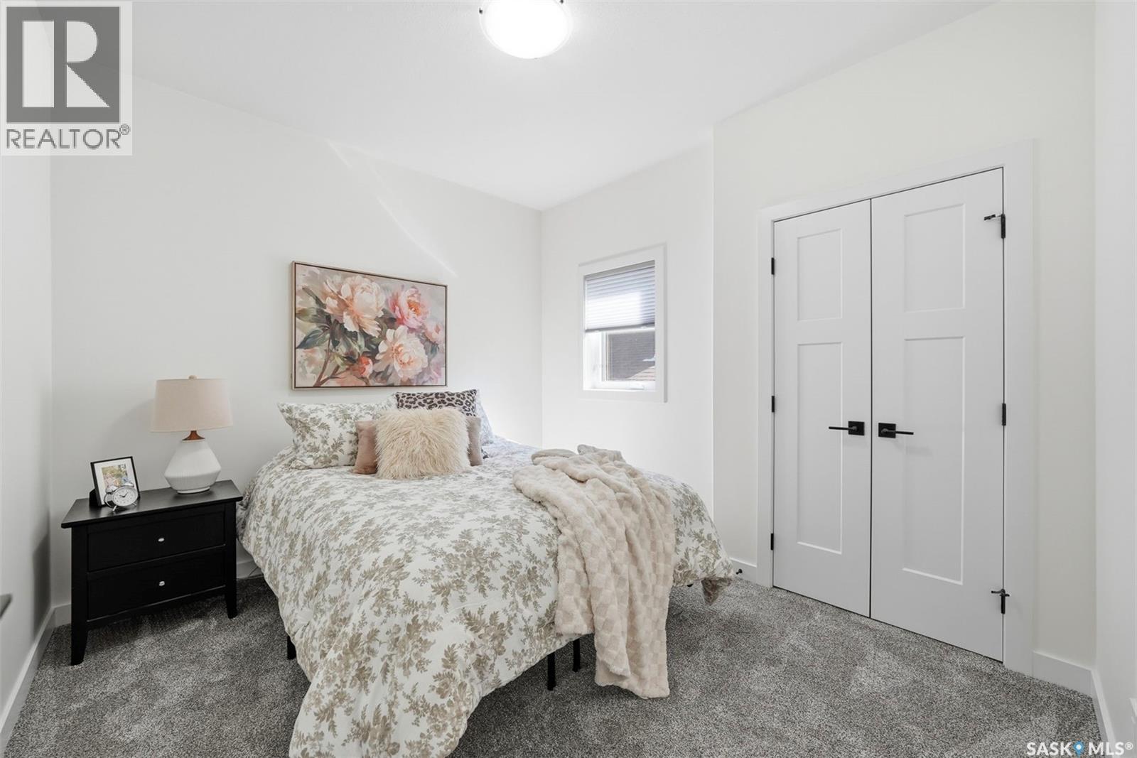 709 Sarazen Drive, Warman, SK - Indoor Photo Showing Bedroom