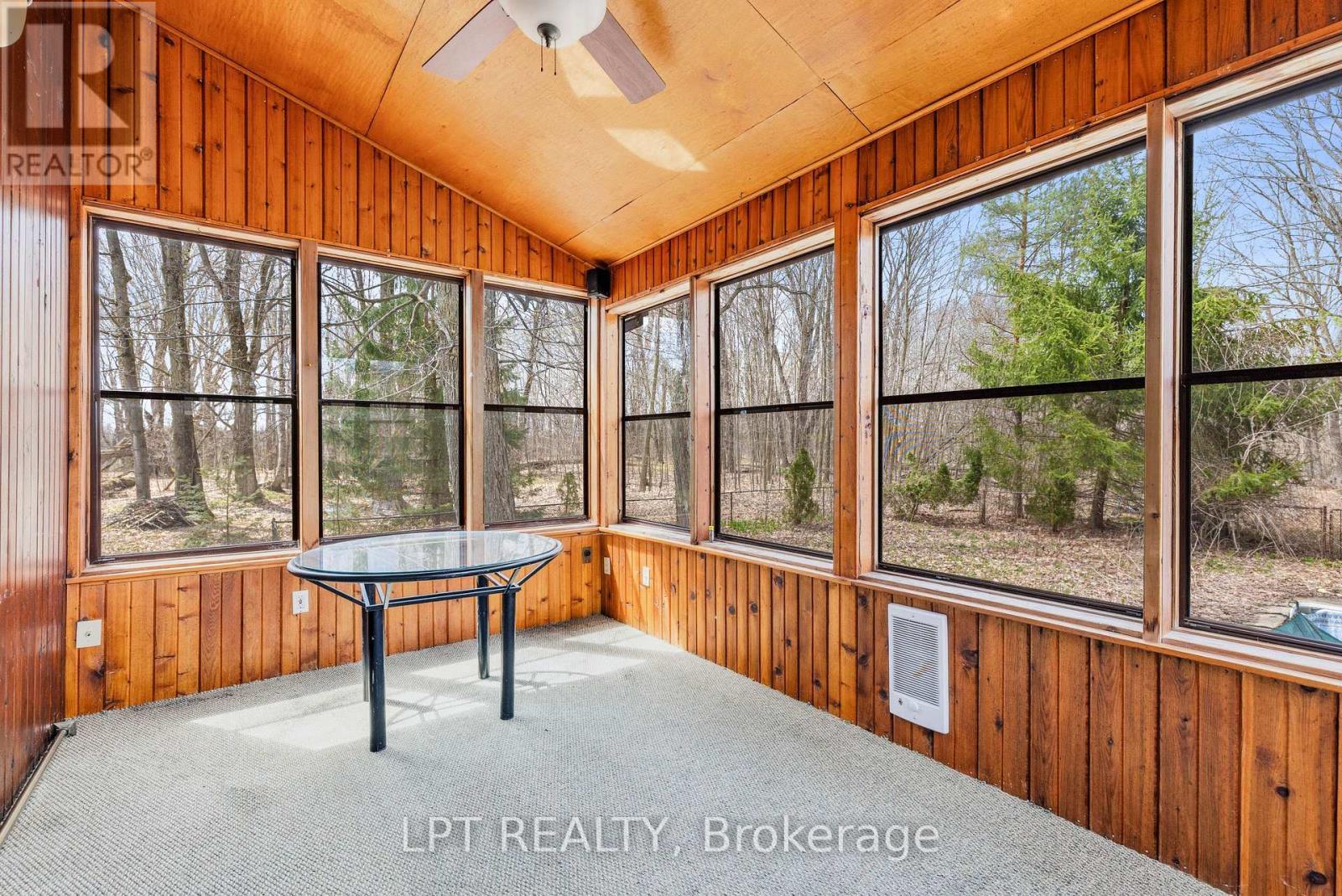 Sunroom Overlooking Property - 50 Concession Rd 2 W, Tiny, ON - Indoor Photo Showing Other Room