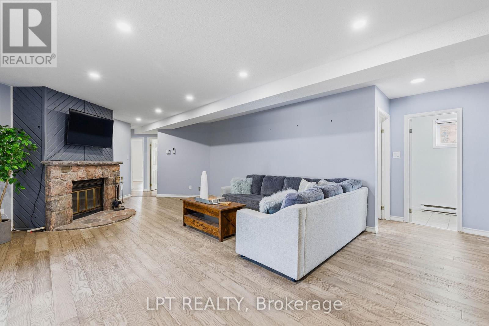 50 Concession Rd 2 W, Tiny, ON - Indoor Photo Showing Living Room With Fireplace